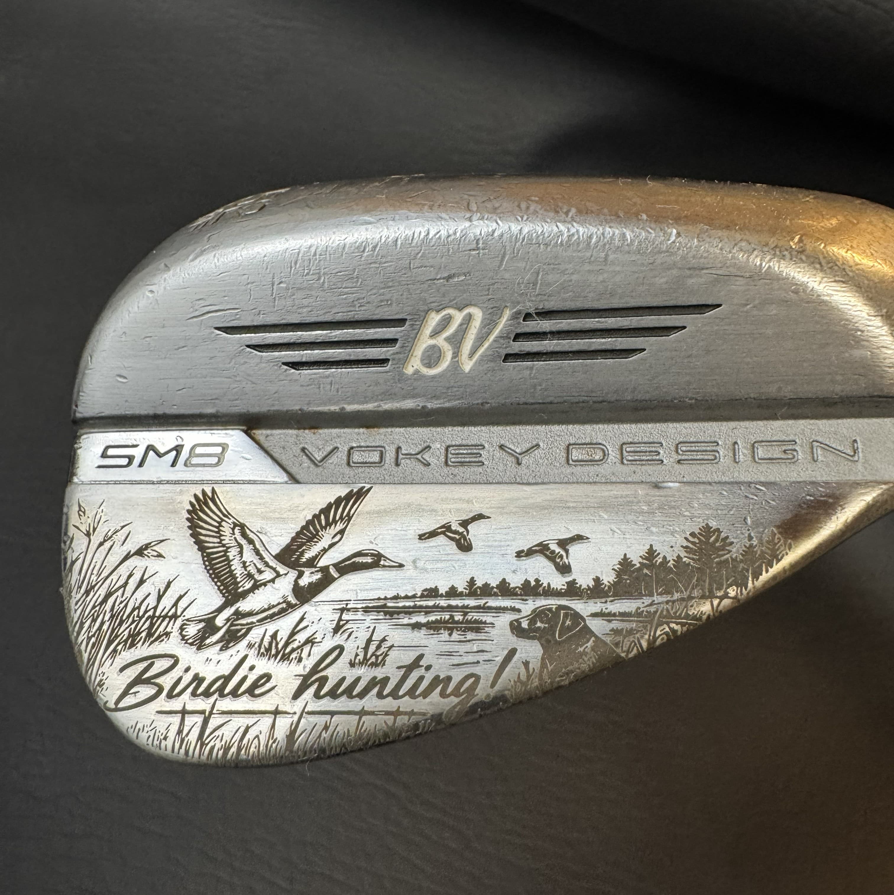 Custom bird hunting themed engraving on a golf wedge