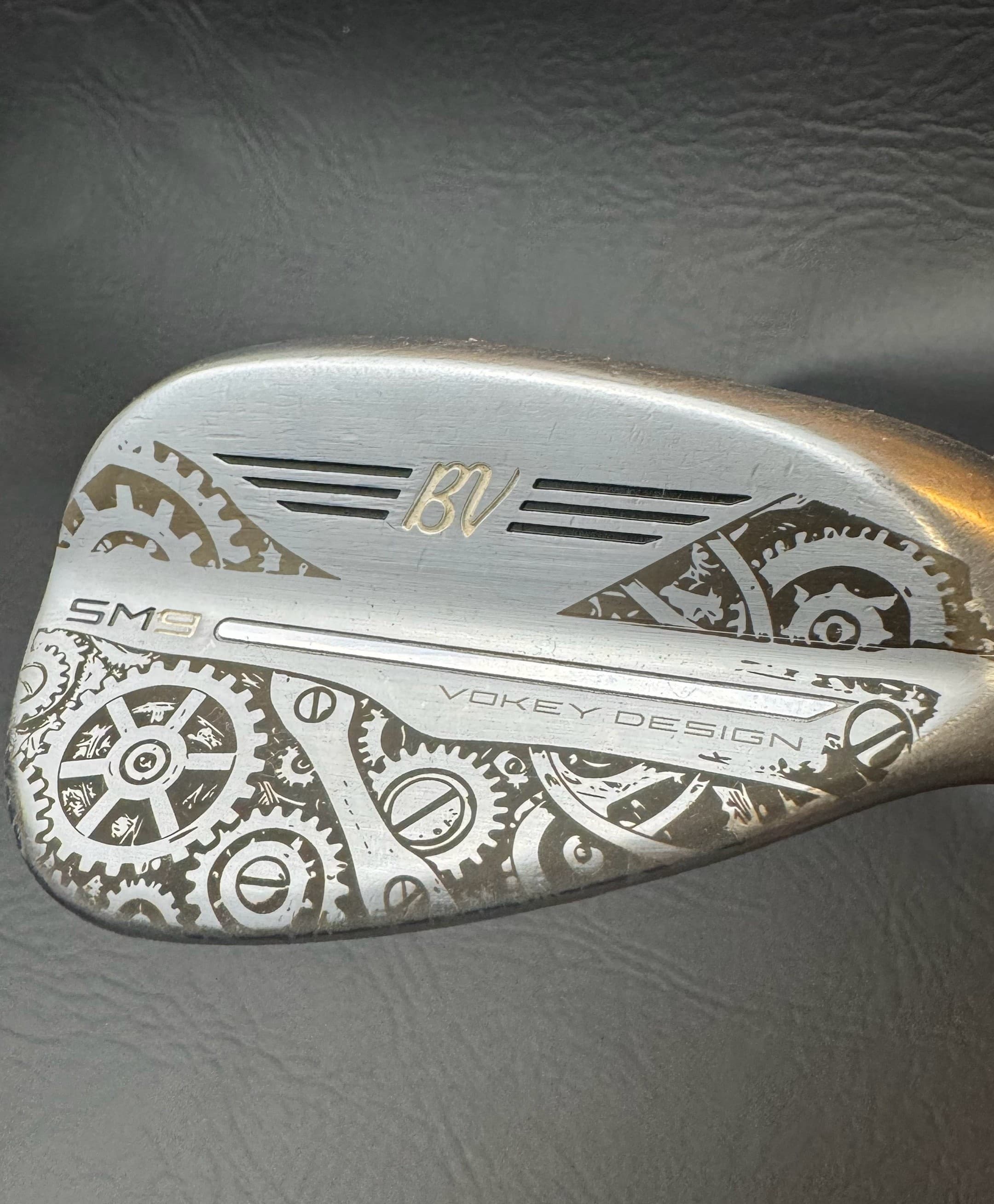 Custom gears and cogs engraving on a golf wedge