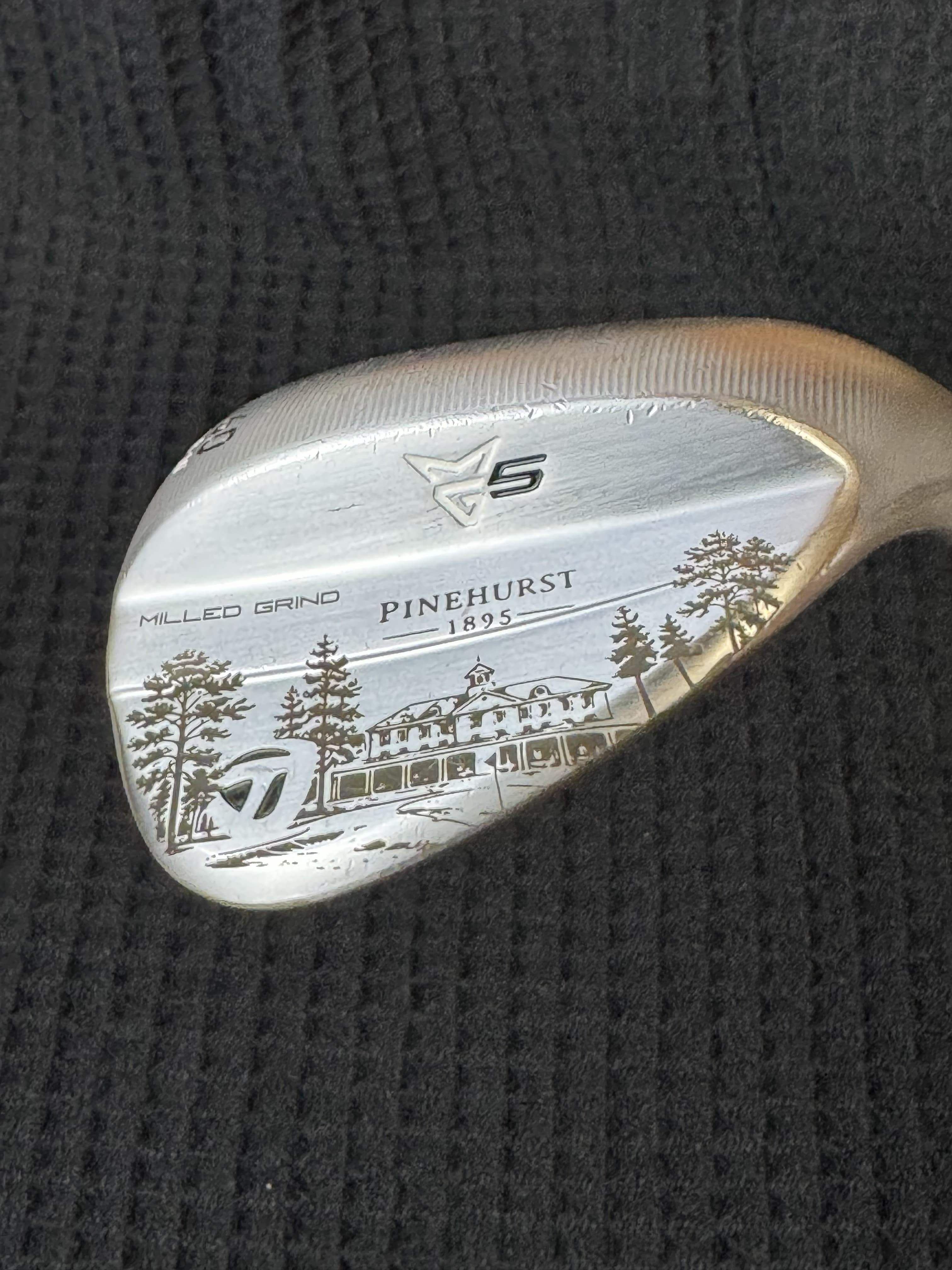 Pinehurst 1895 clubhouse scene engraved on a custom TaylorMade wedge