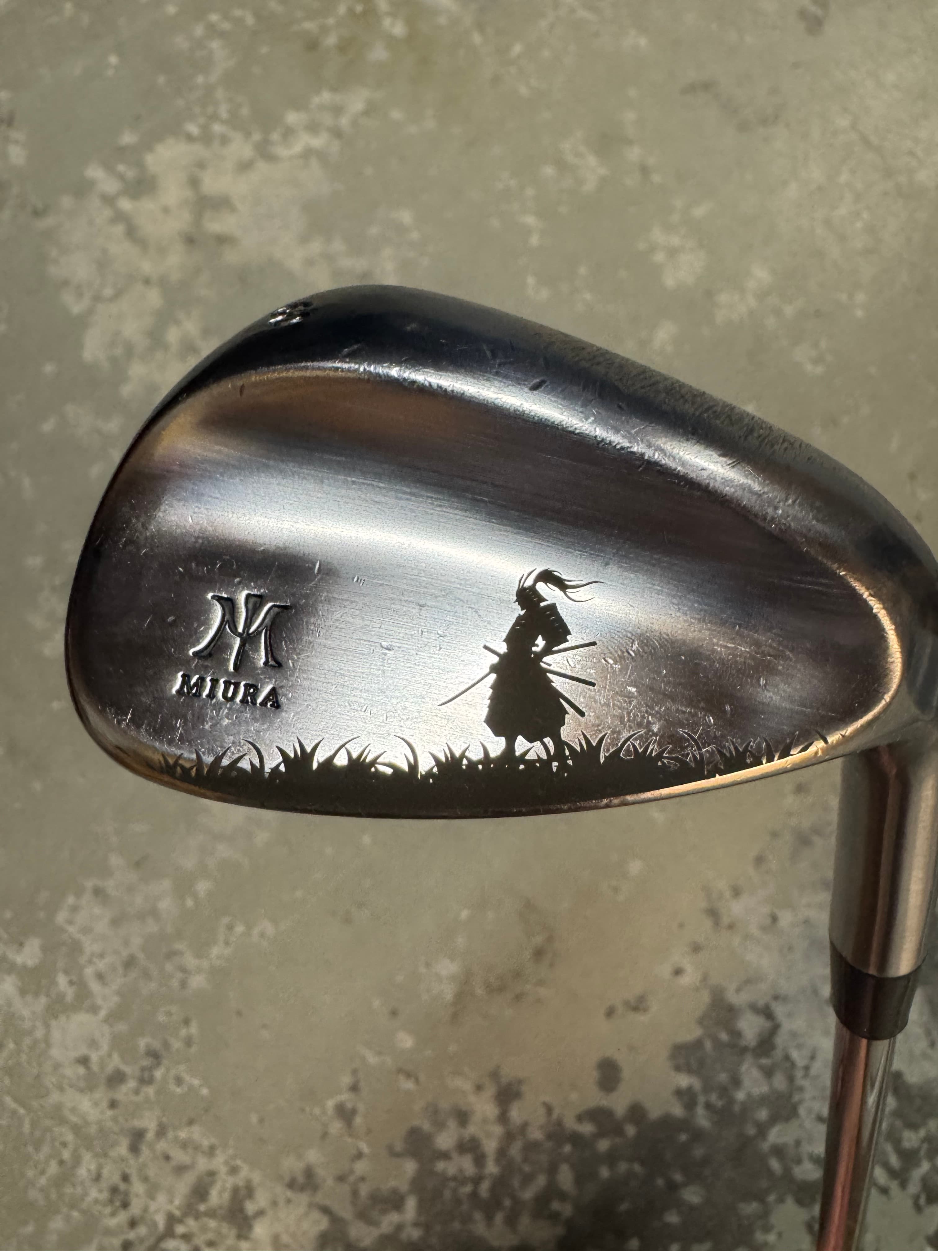 Miura wedge featuring a custom samurai engraving